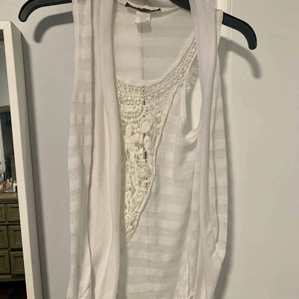 white sleeveless cardigan